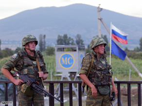 Russian peacekeepers guard their outpost at South Ossetian border in an unknown location in Georgia, Thursday.