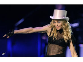 Madonna performs on stage at the premier of her 'Sticky and Sweet' world tour at Cardiff's Millennium Stadium in Wales, Saturday.