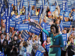 Michelle Obama, wife of Democratic Presidential candidate Barack Obama, acknowledges supporters at the Democratic National Convention 2008, Monday.