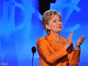 New York Senator and former presidential candidate Hillary Clinton acknowledges the audience as she takes the stage at the Democratic National Convention,Tuesday.