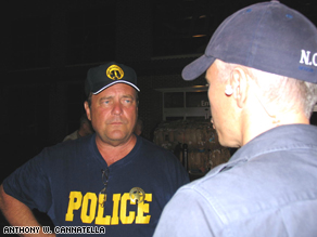 Anderson Cooper on patrol with the New Orleans Police Department and Chief Anthony Cannatella during Hurricane Katrina.
