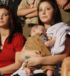 Bristol Palin, 17, holds her brother Trig during the campaign rally