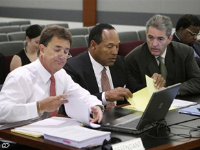 O.J. Simpson withlawyers Gabriel Grosso, right, and Yale Galanter during the second day of the jury selection in Las Vegas.