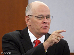 Former O.J. Simpson agent Mike Gilbert points to Simpson as he testifies during Simpson's trial.