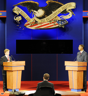Mississippi students act as stand-ins as the Commission on Presidential Debates prepares, Thursday, for the presidential debate scheduled for Friday at the Ford Center in Oxford, Mississippi.