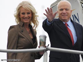 John McCain and wife Cindy board his campaign plane for the flight from Washington to the Mississippi debate.