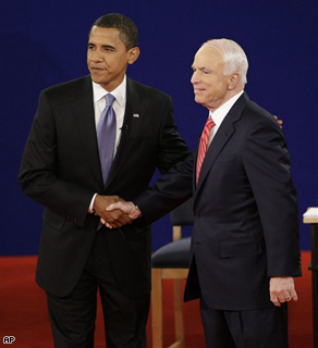 Democratic presidential candidate Sen. Barack Obama and Republican candidate Sen. John McCain shake hands at the start of a townhall-style presidential debate at Belmont University in Nashville, Tennessee, Tuesday.