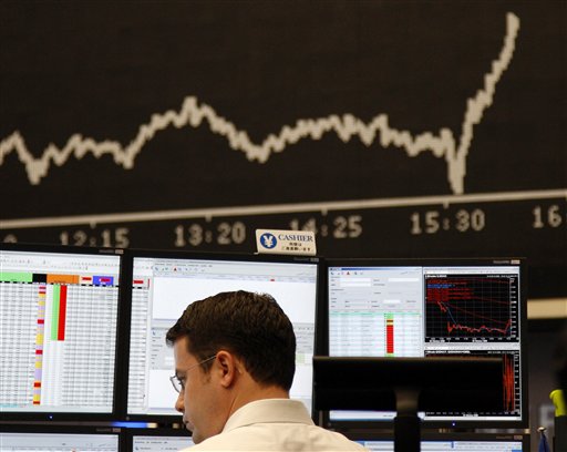 A broker is seen at the stock exchange in Frankfurt, central Germany, on Friday. Europe's stock markets plunged Friday after Wall Street opened a breathtaking 7 percent lower, below the 8,000 level, but they soon recouped some of those losses when the Dow Jones index made a partial comeback.