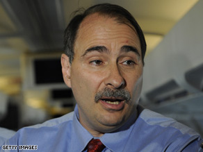 David Axelrod spoke with reporters on board a plane en route to New York Wednesday.
