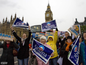 Supporters of Barack Obama rally on Westminster bridge in London on Saturday. 
