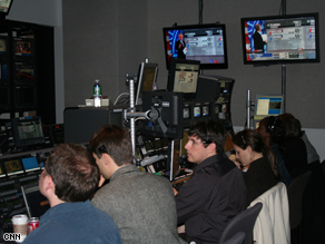 Richard Morris, second from left, in an election night control room.