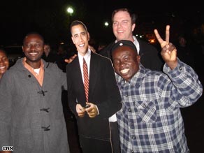 Revellers outside the White House pose with the President-Elect.