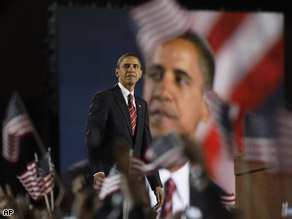 President-elect Barack Obama looks out into the crowd after his acceptance speech at Grant Park in Chicago