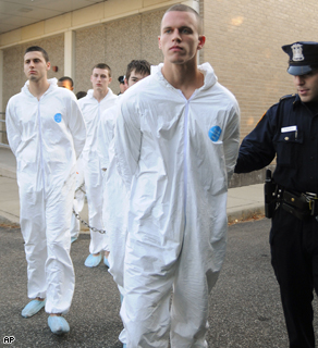 Jeffrey Conroy, 17, and other teens arrested in a hate crime murder, are led out of the Fifth Precinct in Patchogue, N.Y., for arraignment on gang assault charges in connection with the death of a 37-year old immigrant.