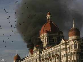 Teams of heavily armed gunmen stormed luxury hotels, a popular restaurant, hospitals and a crowded train station in Mumbai on Wednesday night.