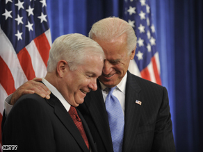 Vice-President elect Joseph Biden smiles with Secretary of Defense Robert Gates at a press conference on Monday. 