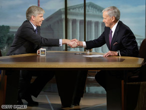 NBC's David Gregory, left, shakes hands with Tom Brokaw on the set 'Meet the Press' Sunday.