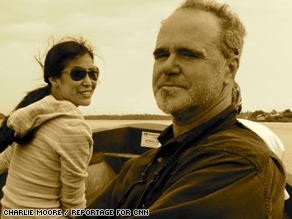 Planet In Peril Senior Photojournalist Philip Littleton with Lisa Ling on assignment