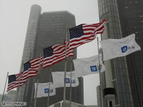 Flags fly outside of the General Motors Corp. in Detroit, Michigan.