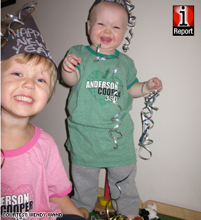 Zachary Wand, 3, and his younger brother Carter, 1, at a New Year's Eve party at home in Ontario, Canada.