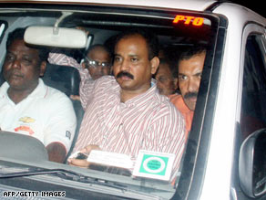 Satyam founder B. Ramalinga Raju is shown Saturday being sent to prison in Hyderabad.
