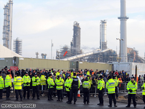 Protesters gather outside the Total Lindsey oil refinery in north-east England on January 30.