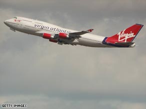 Virgin Atlantic's profit has nearly doubled in the past year despite the recession.