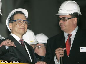 File photo of Chinese Premier Wen Jiabao on a 2006 tour of a Rio Tinto plant in Western Australia.
