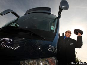 Driver Leon Batchelor helps unveil the first Greyhound coach to operate in the UK.