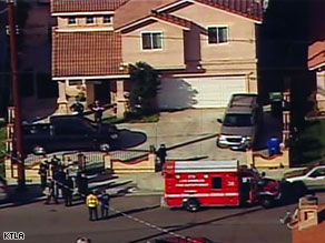 The bodies were found inside this home in the Los Angeles suburb of Wilmington.