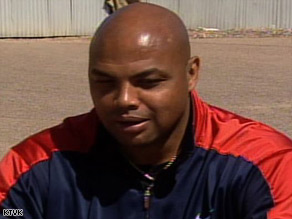 Charles Barkley bristled at the implication he should be wearing stripes instead of a red-and-bue sweatsuit.