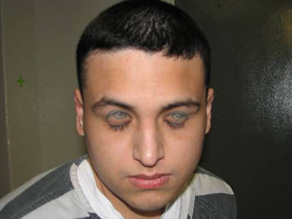 Gabriel Cardona, who shows his tattooed eyelids, worked as a hit man for a Mexican cartel.