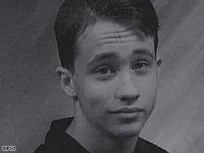 Suspect Richard Poplawski, in an undated North Catholic High yearbook photo, is in police custody.