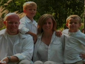 Chris and Sheri Coleman are shown with their two boys, Garret and Gavin.