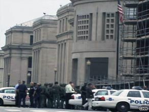 Police cars mass outside the Holocaust Memorial Museum in Washington after a shooting there on Wednesday.