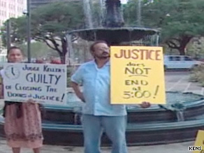 Protesters demonstrate outside the courthouse on Monday.