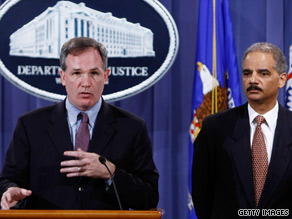 U.S. Attorney Patrick Fitzgerald, left, and Attorney General Eric Holder announce the indictments Thursday.