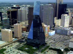 Authorities say a suspect tried to set off a bomb attached to a vehicle at the base of the Fountain Plaza tower.