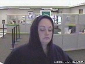 Female robber claiming to have bomb hits banks