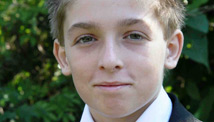 Teen set afire struggles to survive