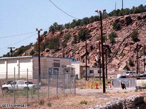 Officials are trying to determine the source of beryllium found at Los Alamos National Laboratory.