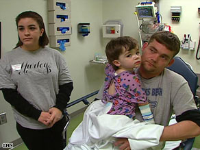 Two-year-old Talan, with Trisha and Jeremy Williamson, has been battling a recurring MRSA infection.