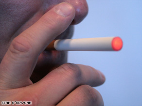 When an e-cigarette user inhales, a battery inside warms liquid nicotine stored in a plastic filter.