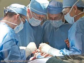 Dr. Bohdan Pomahac, second from right, leads the team that  performed a partial face transplant in Boston.