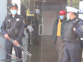 Security guards outside the Mexico City Respiratory Hospital on Monday.