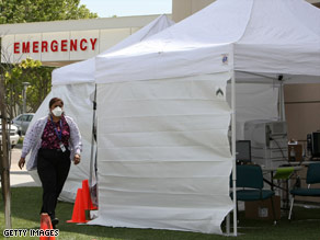 Hospitals like Sutter Delta Medical Center in Antioch, California, set up triage tents to handle overcrowding