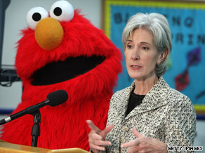 Kathleen Sebelius and Elmo spoke in May at a news conference about the H1N1 flu public service ads.