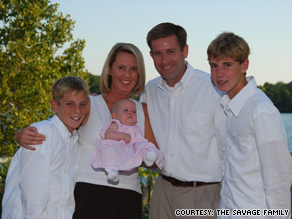 Sean and Carolyn Savage with daughter Mary Kate (now 18 months) and sons Ryan, left, and Andrew.