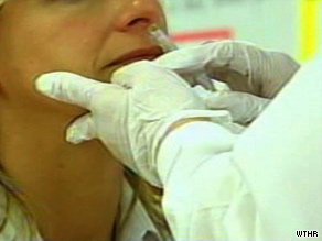 Health care workers in Indiana and Tennessee are among the first to receive the H1N1 vaccine Monday.