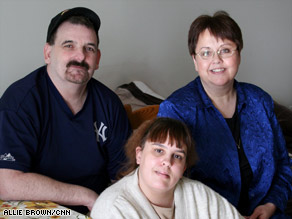 Suezette Steinhardt, right, helped George and Carolina Wines move from their van to an apartment.